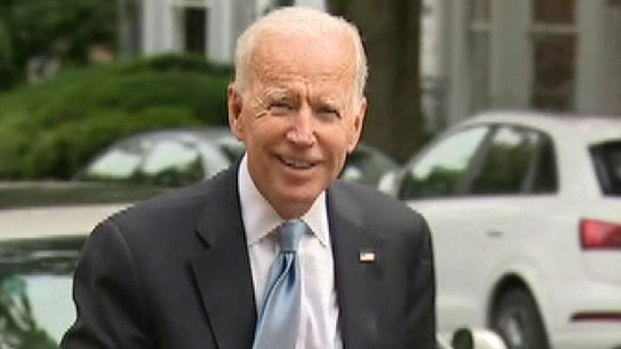 Former VP Joe Biden gives brief comments to reporters outside a campaign fundraiser in Washington, D.C.