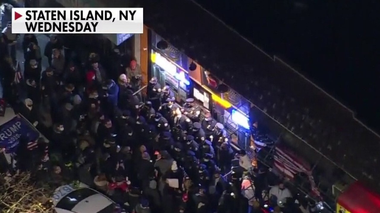 Hundreds of protesters gather outside Staten Island restaurant in show of support for owner