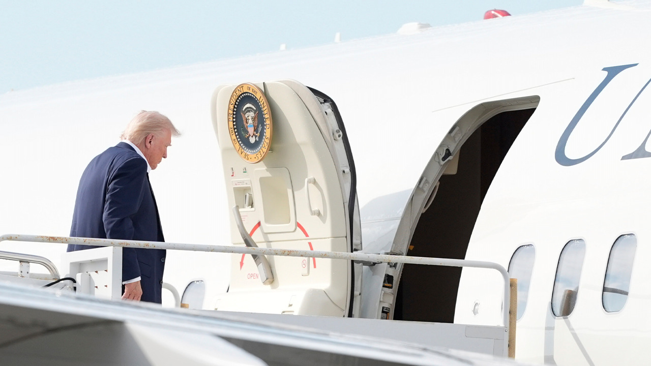  President Trump talks to reporters arsenic  helium  returns to DC