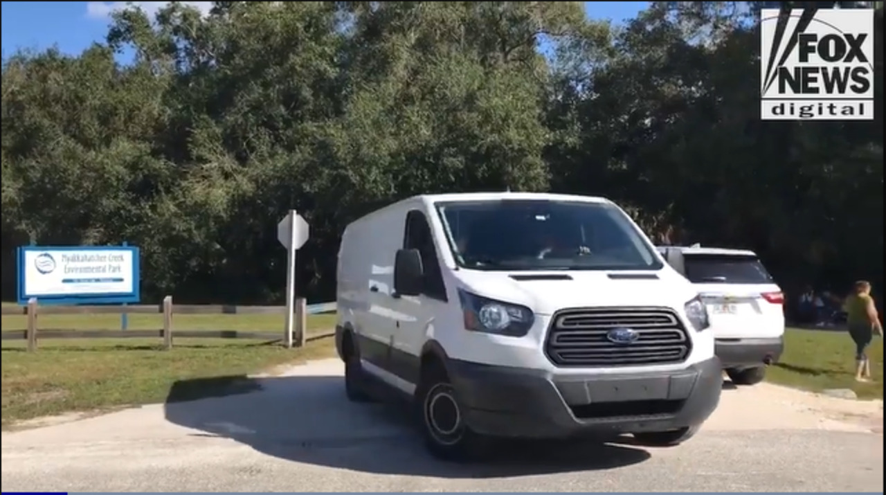 EXCLUSIVE: Coroner van leaves Florida park after possible human remains discovered in hunt for Brian Laundrie