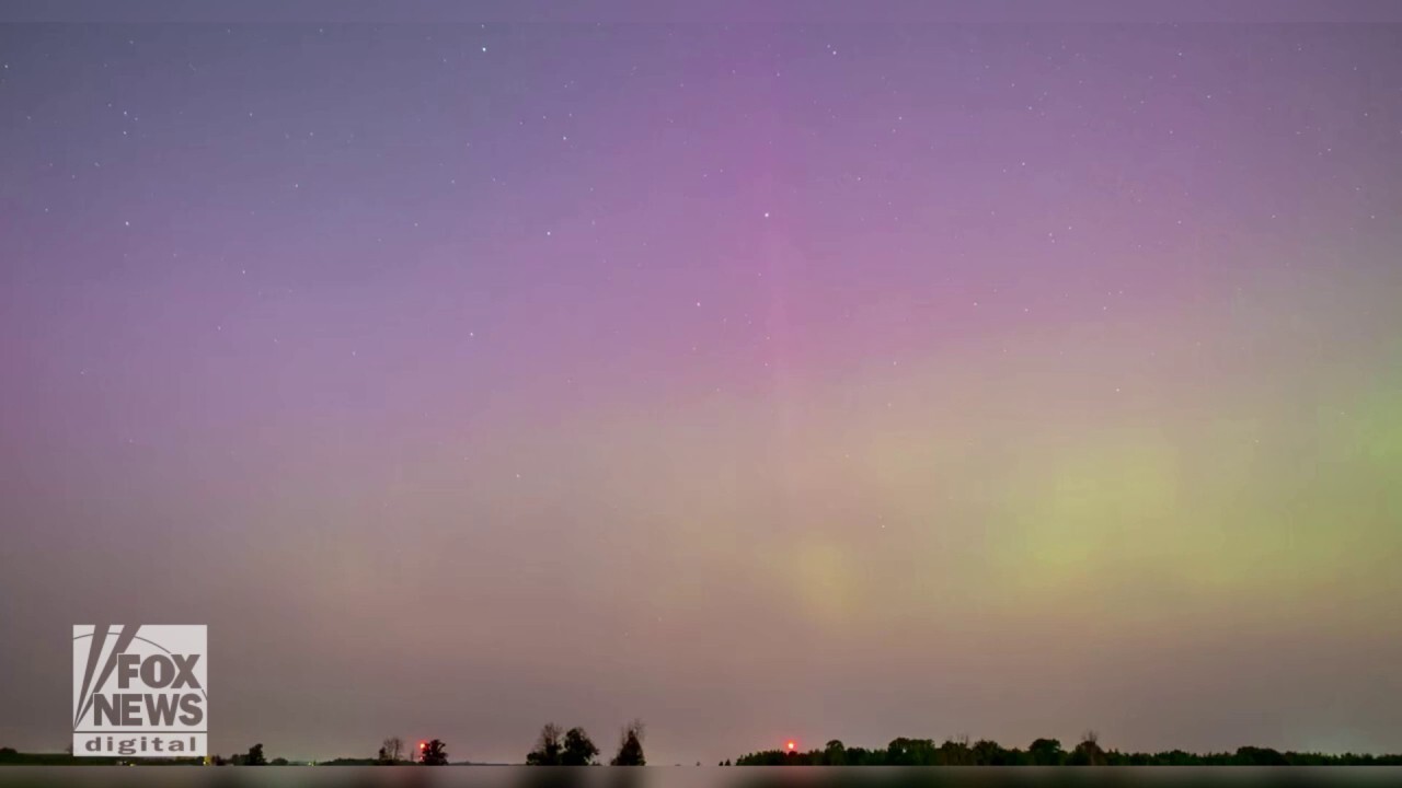 Pink and green sky shines over Canada