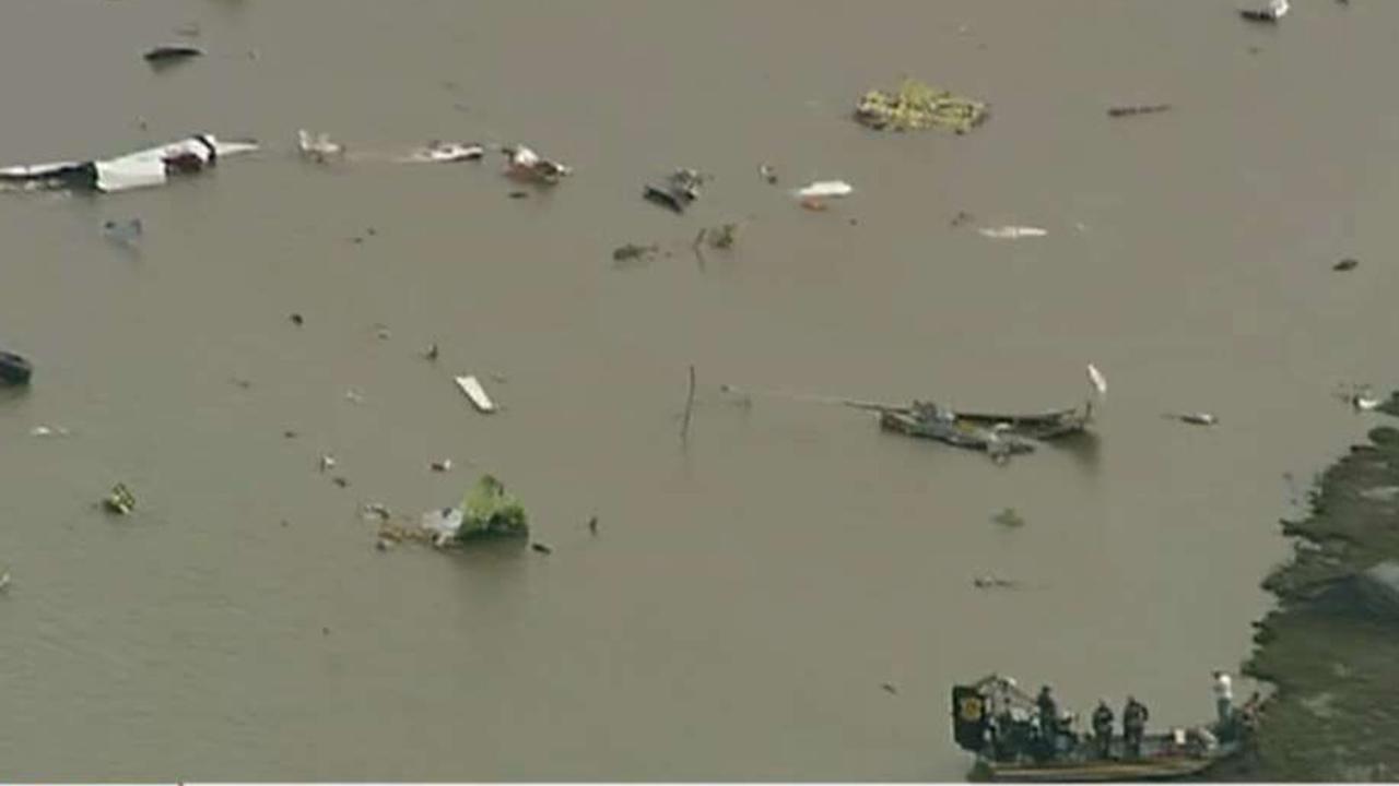 Cargo plane crashes in Trinity Bay, Texas.