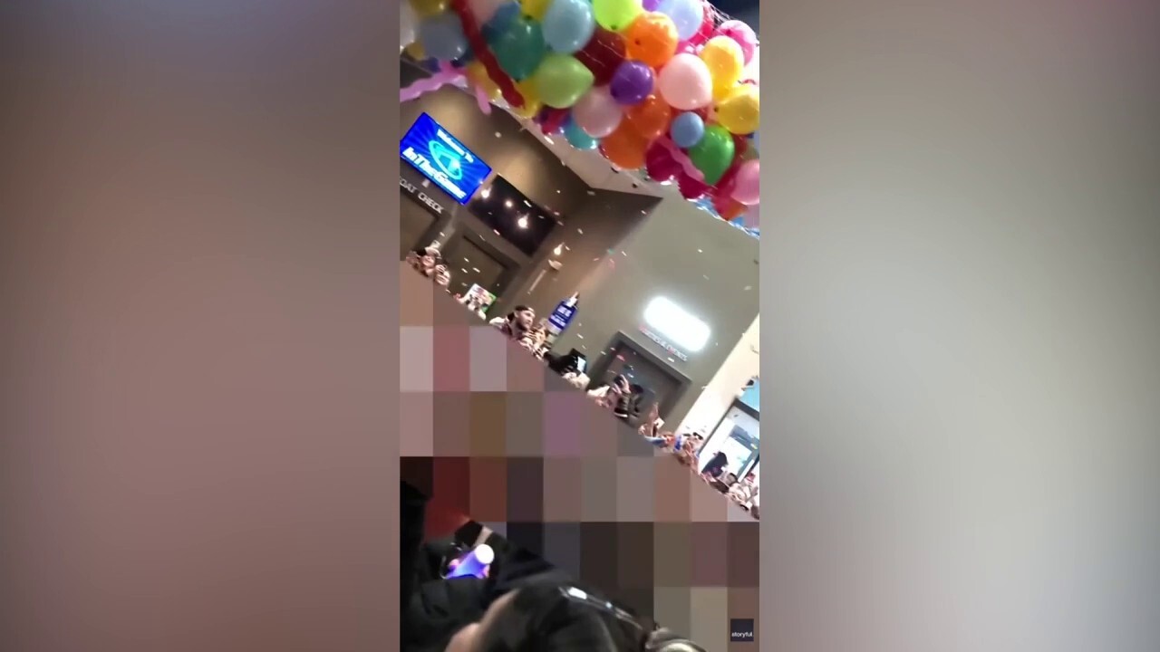 Brick display collapses on crowd after balloon drop goes wrong at NYE arcade party