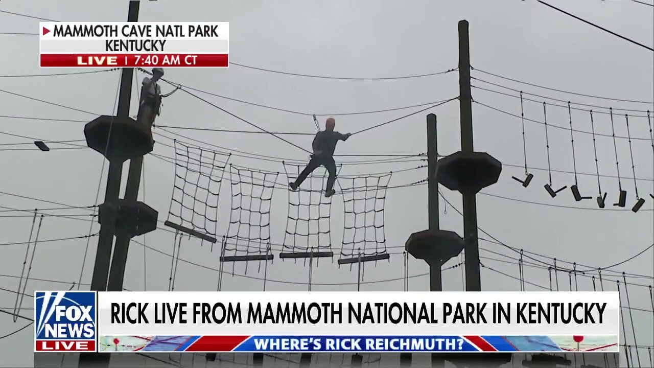 Rick Reichmuth attempts the Mammoth Cave obstacle course