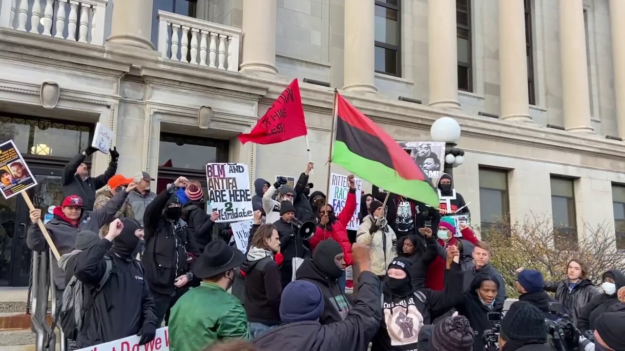 Protesters hold prayer, moment of silence outside Kenosha County