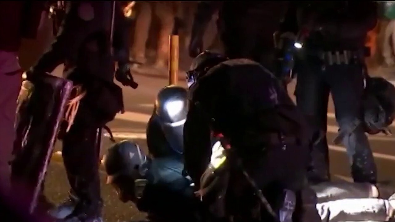 Seattle protesters demand cuts to police staff, budget	