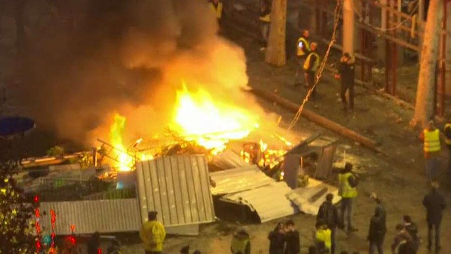 Gas-price protesters burn scaffolding in Paris