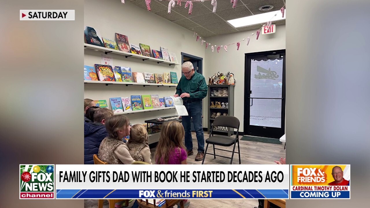 A Christmas gift over 50 years in the making: Family gifts dad with book he started decades ago