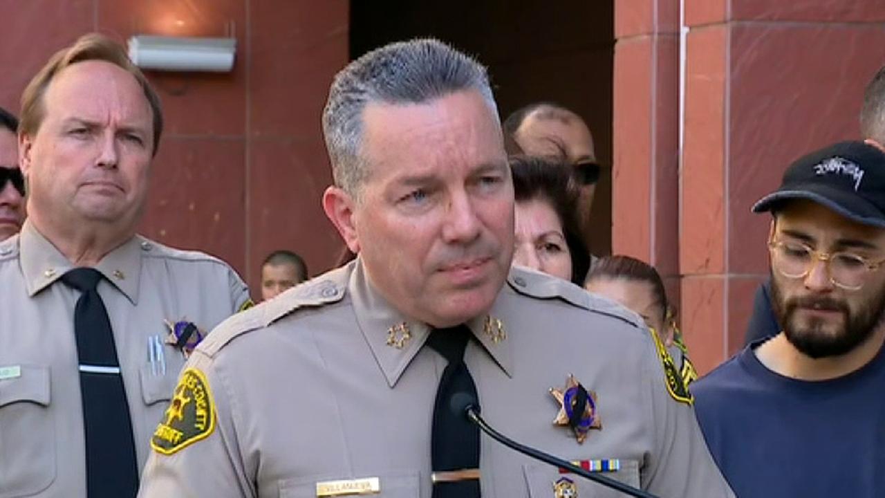 LA County Sheriff Alex Villanueva answers questions following a press conference on the shooting of a Sheriff's deputy.