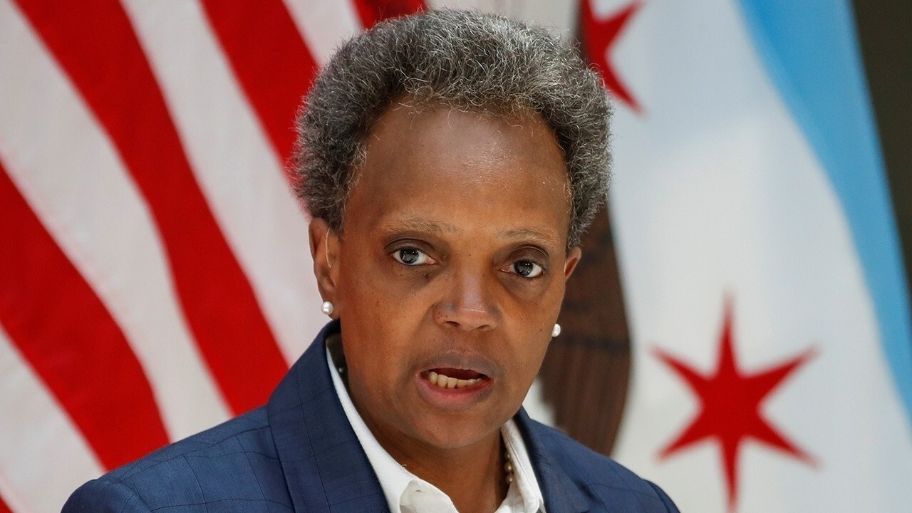 Lori Lightfoot slammed for dancing in the street as crime surges in Chicago: 'Deeply troubling'