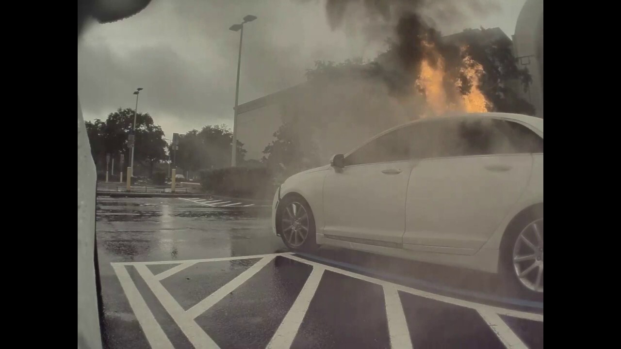 Florida woman was shoplifting when car with two children inside bursts into flames, police say