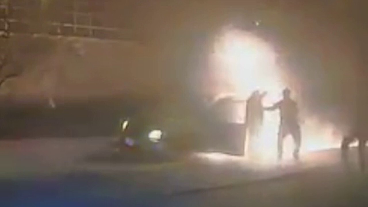 Wisconsin driver pulled to safety after moving minivan erupts in flames, leaves trail of fire: video