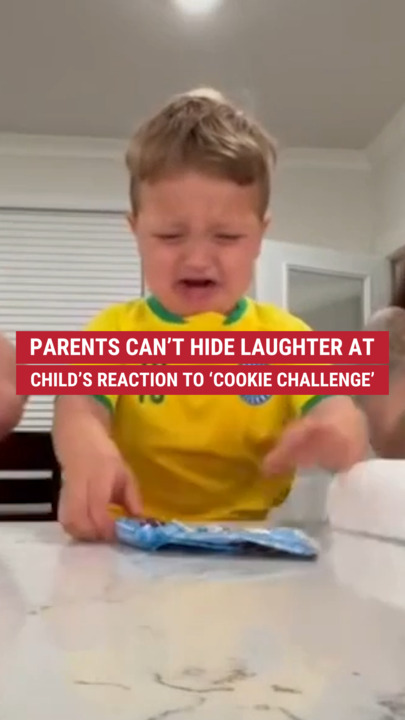 These parents couldn’t clasp  backmost  their laughter astatine  their child’s absorption    to the viral 'Cookie Challenge'