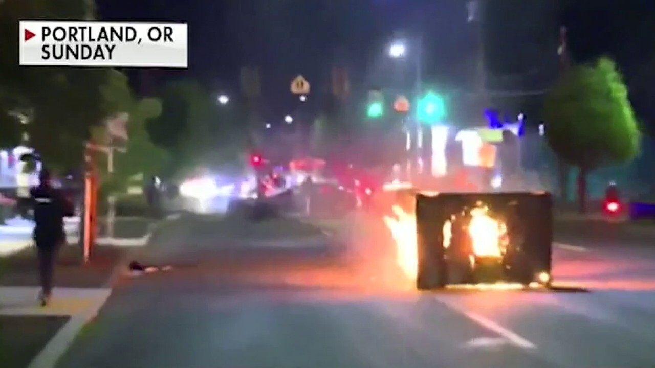 Police declare riot in Portland after protesters march on police union building