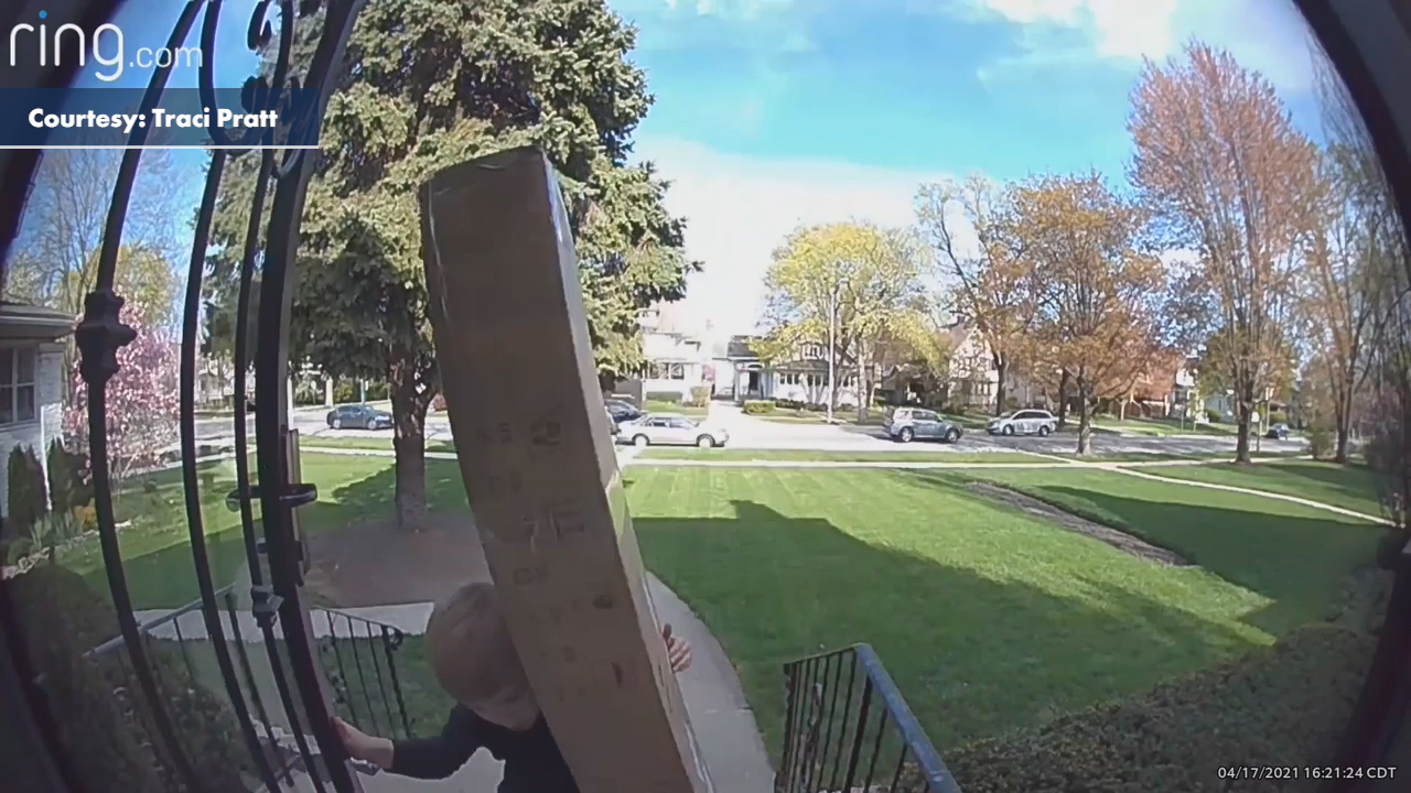 UPS driver saves young boy trapped under heavy package on front step