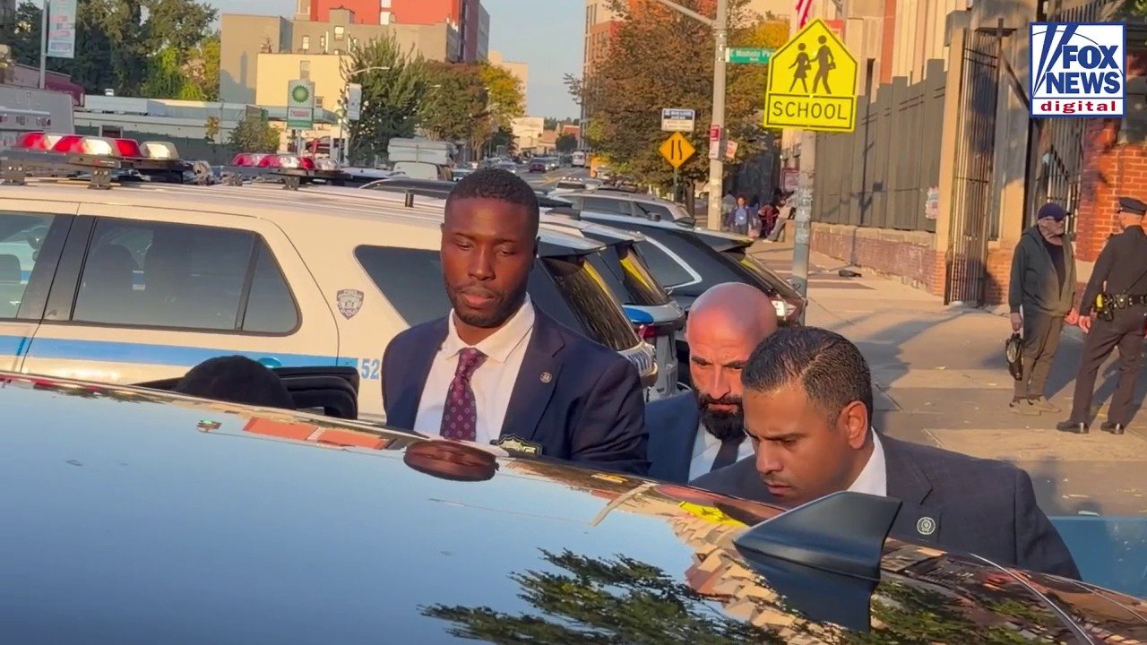 Suspects accused of stabbing, robbing NYPD detective escorted by police after Massachusetts arrests
