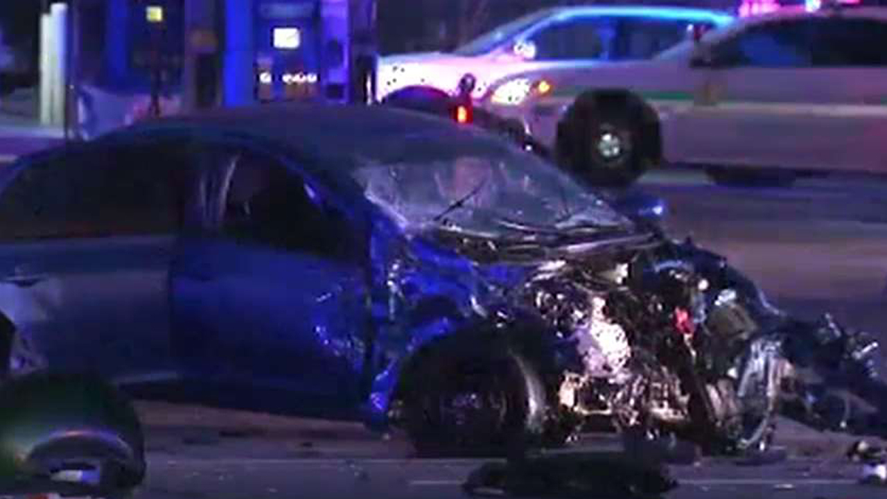 Video: Cop slams into car after blowing through red light