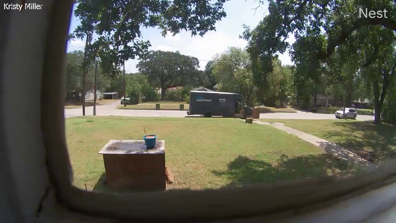 Car slams into Amazon delivery truck with driver still inside