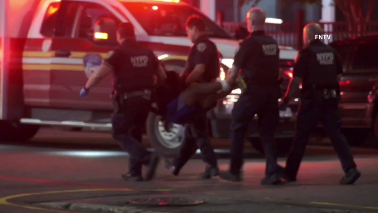 2 NYC police officers shot, suspect taken away in ambulance