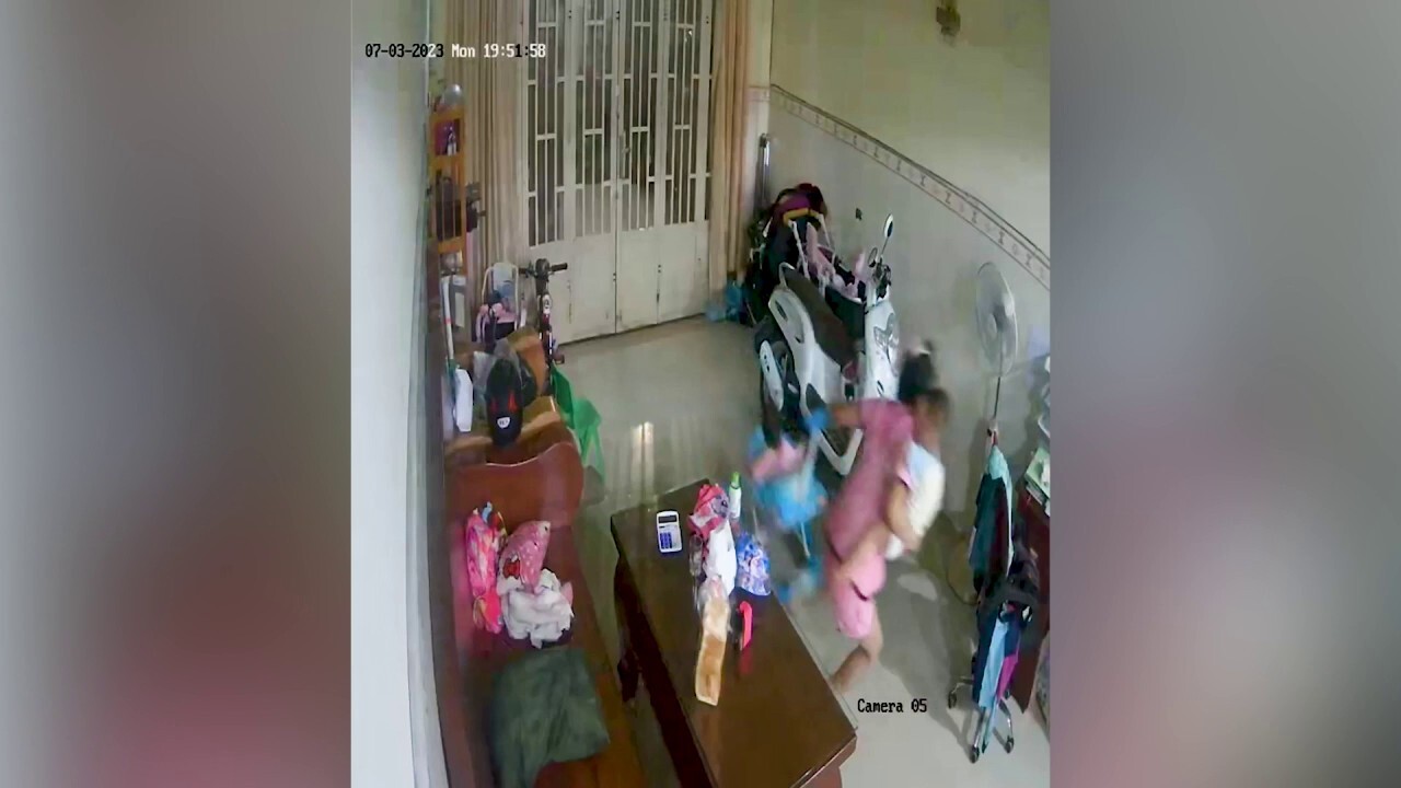 Mother in Cambodia saves child just seconds before home ceiling collapse