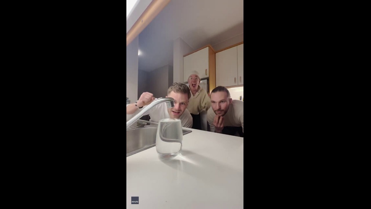 Tense water cup challenge between friends becomes viral hit