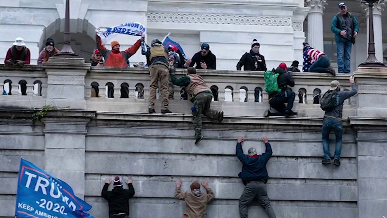 Lawmakers forced to hide as rioters storm into Capitol building