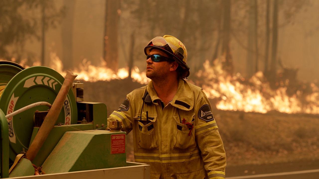 Australia's prime minister calls about 3,000 reservists to help fight deadly wildfires