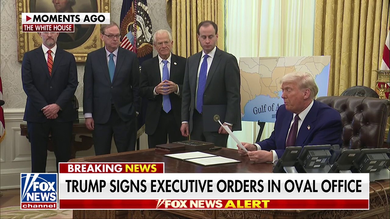 President Donald Trump signs new executive orders on reciprocal tariffs from the Oval Office.