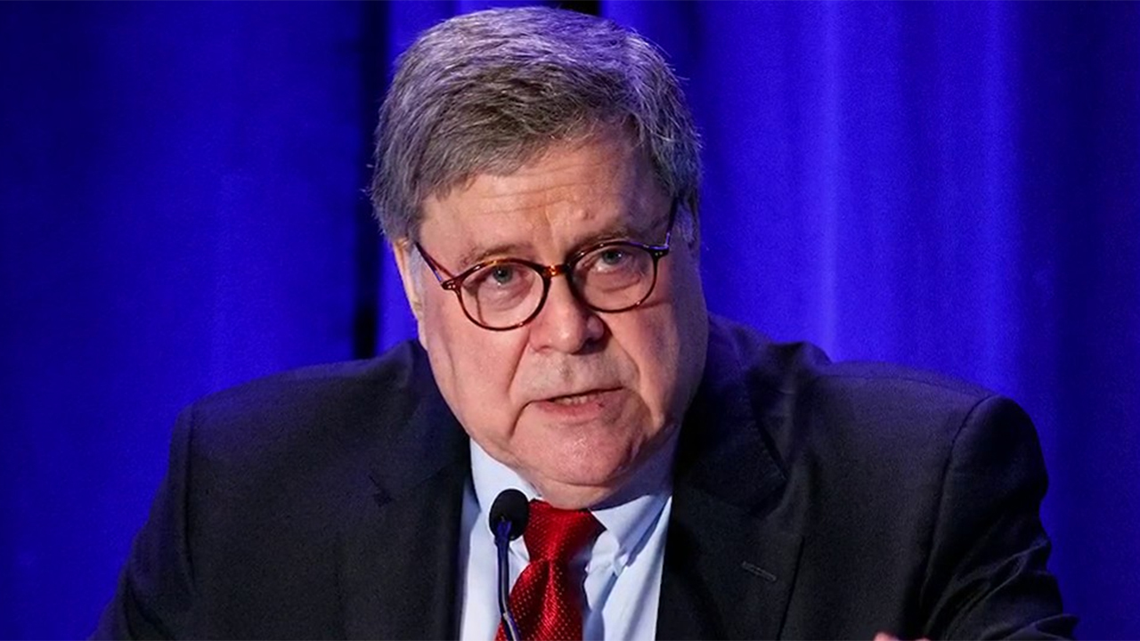 Attorney General Barr under fire for Roger Stone sentencing change