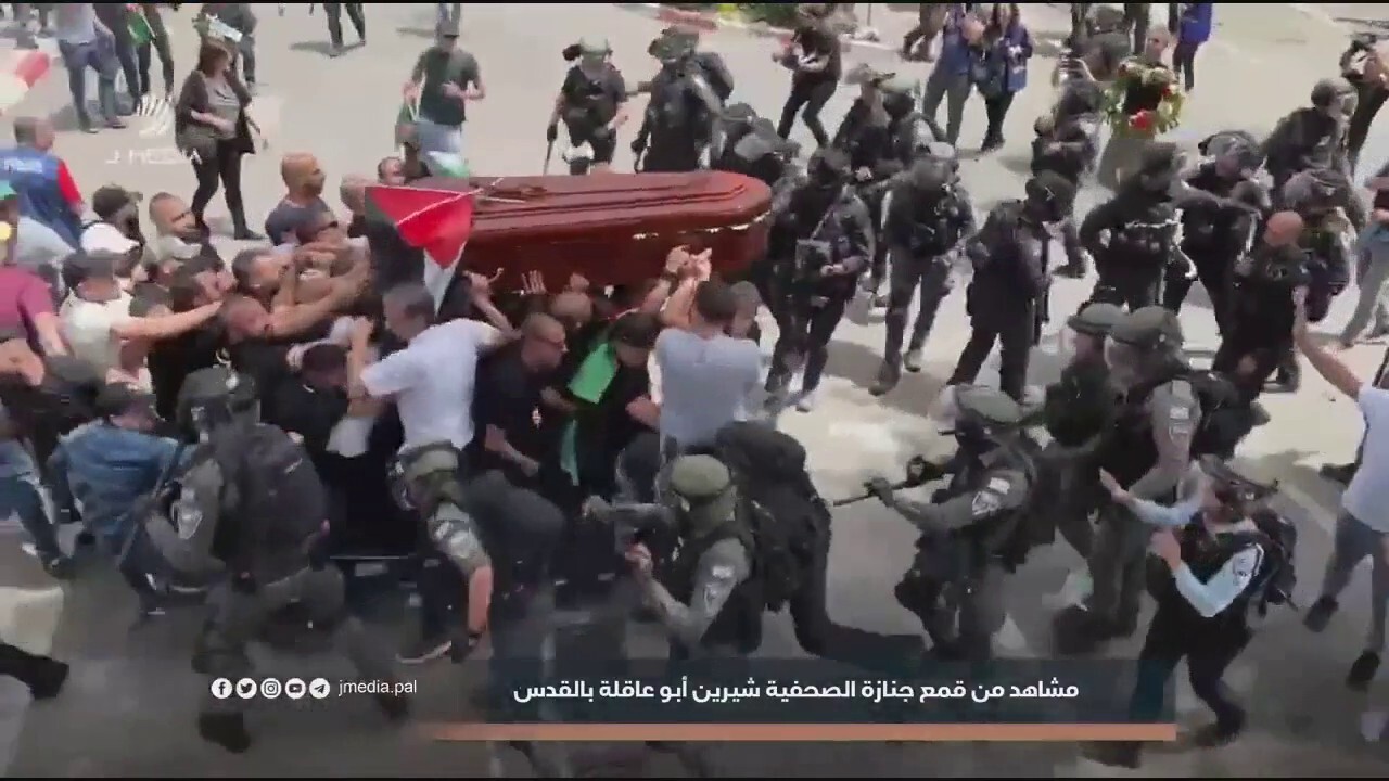 Israeli police clash with mourners carrying casket of Al Jazeera journalist Shireen Abu Akleh