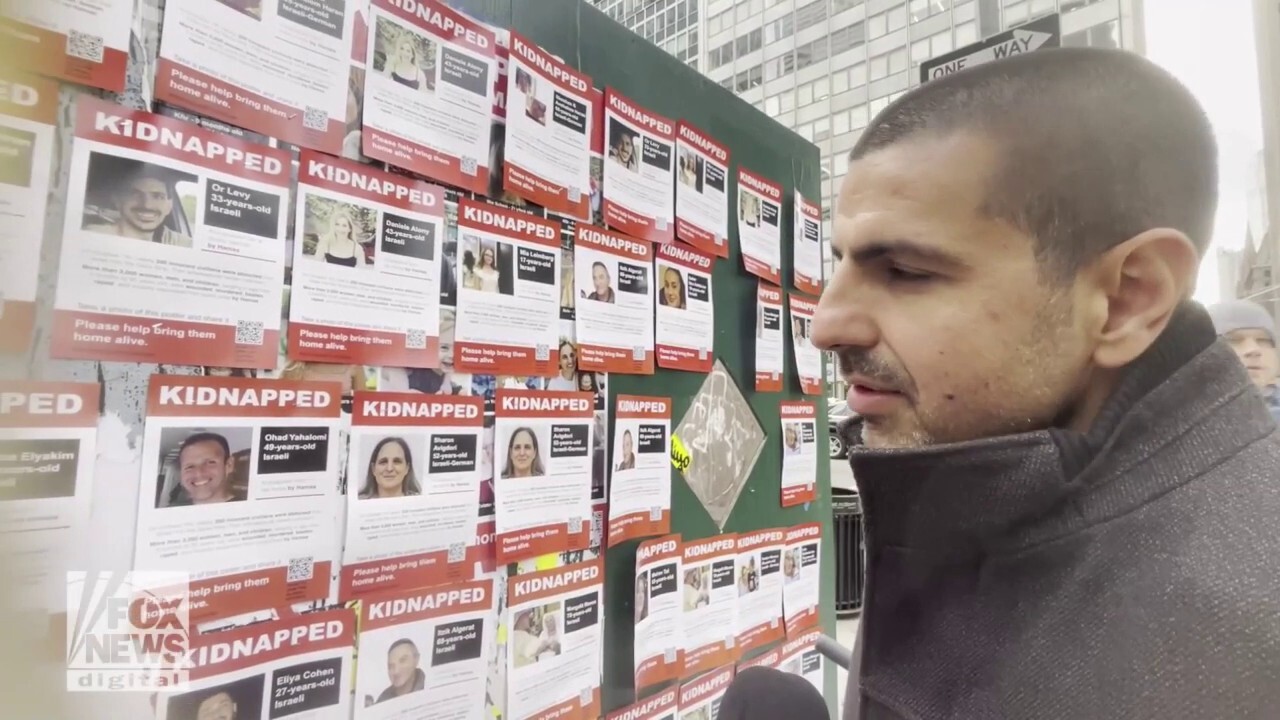 Israeli Michael Levy finds poster of his hostage brother, Or Levy, in NYC