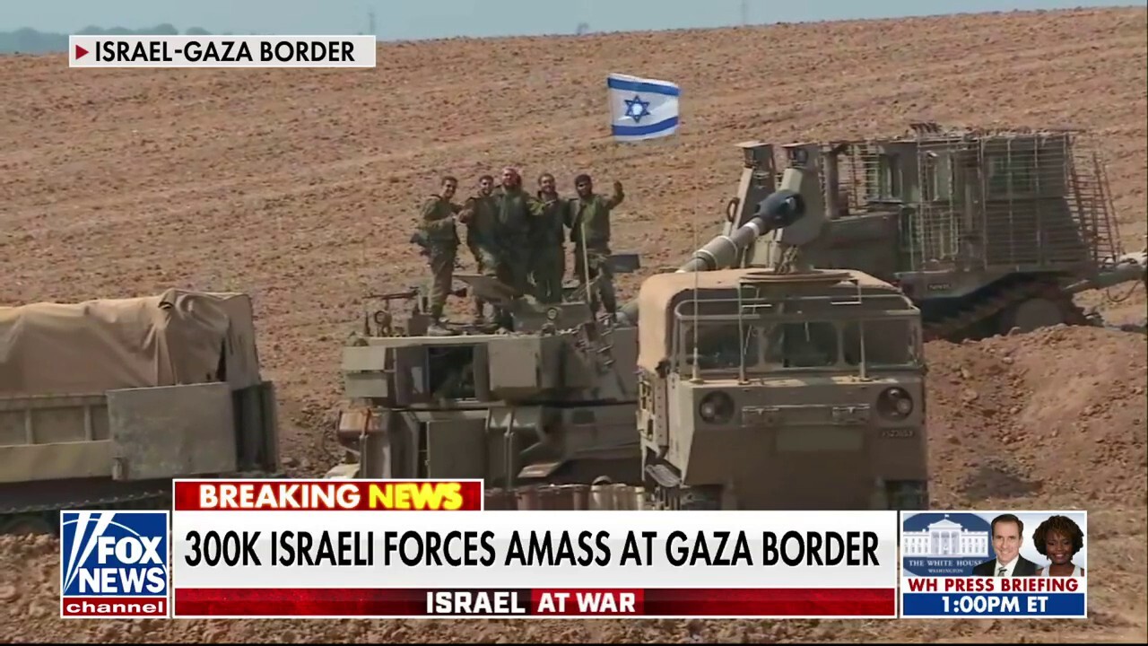 Israeli forces amass at Gaza border in preparation for ground attack