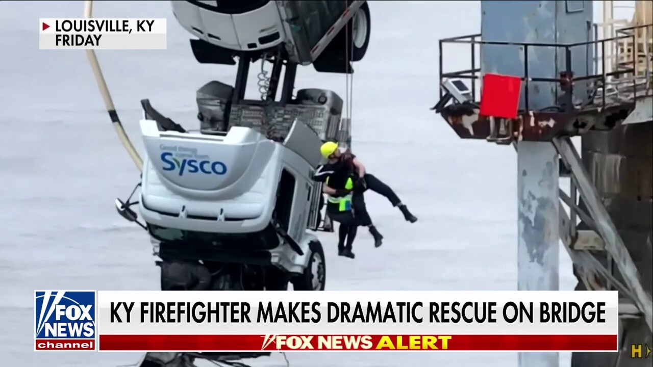 Firefighter who rescued truck driver dangling from bridge speaks out