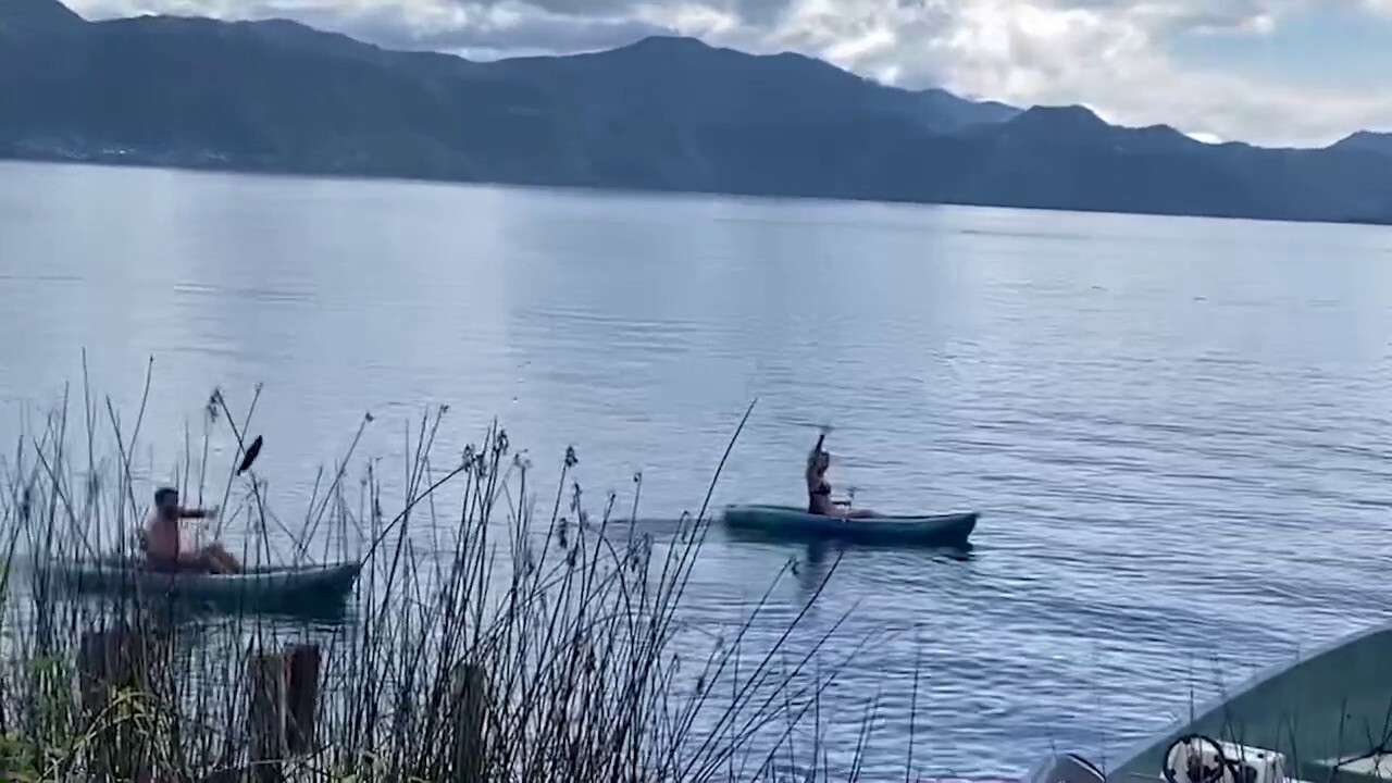 Nancy Ng, 29, seen waving from her kayak on Lake Atitlán in Guatemala before she vanished