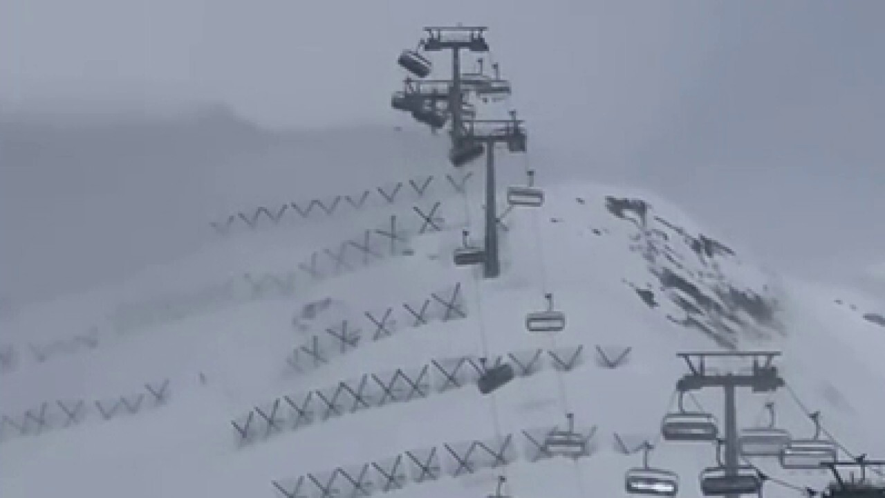 Strong winds swing chair lifts at ski resort in Italy