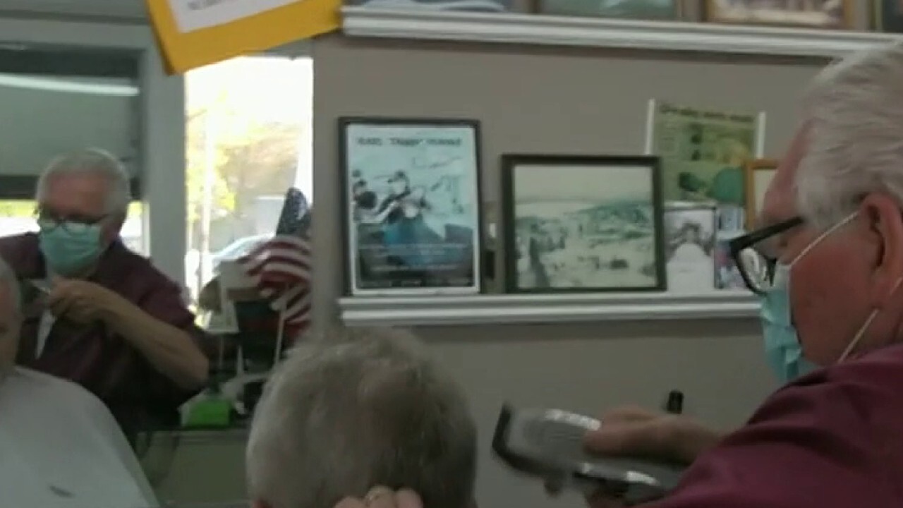 77-year-old barbershop owner defies coronavirus order, reopens business