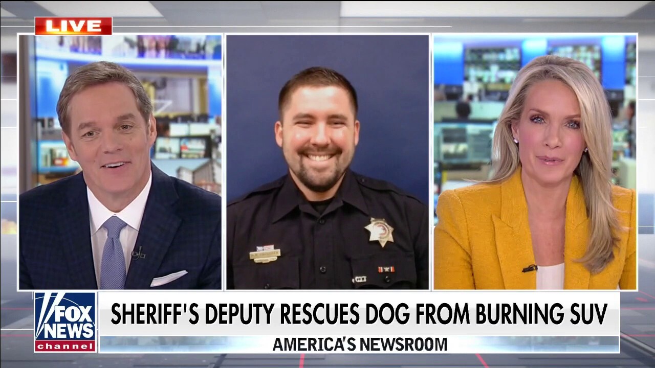 Deputy sheriff rescues dog from burning SUV