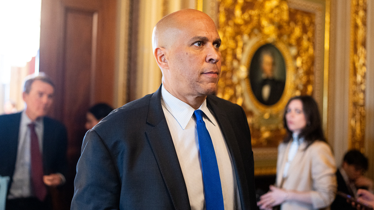  Senator Cory Booker hosts municipality  hallway  aft  grounds   level  speech