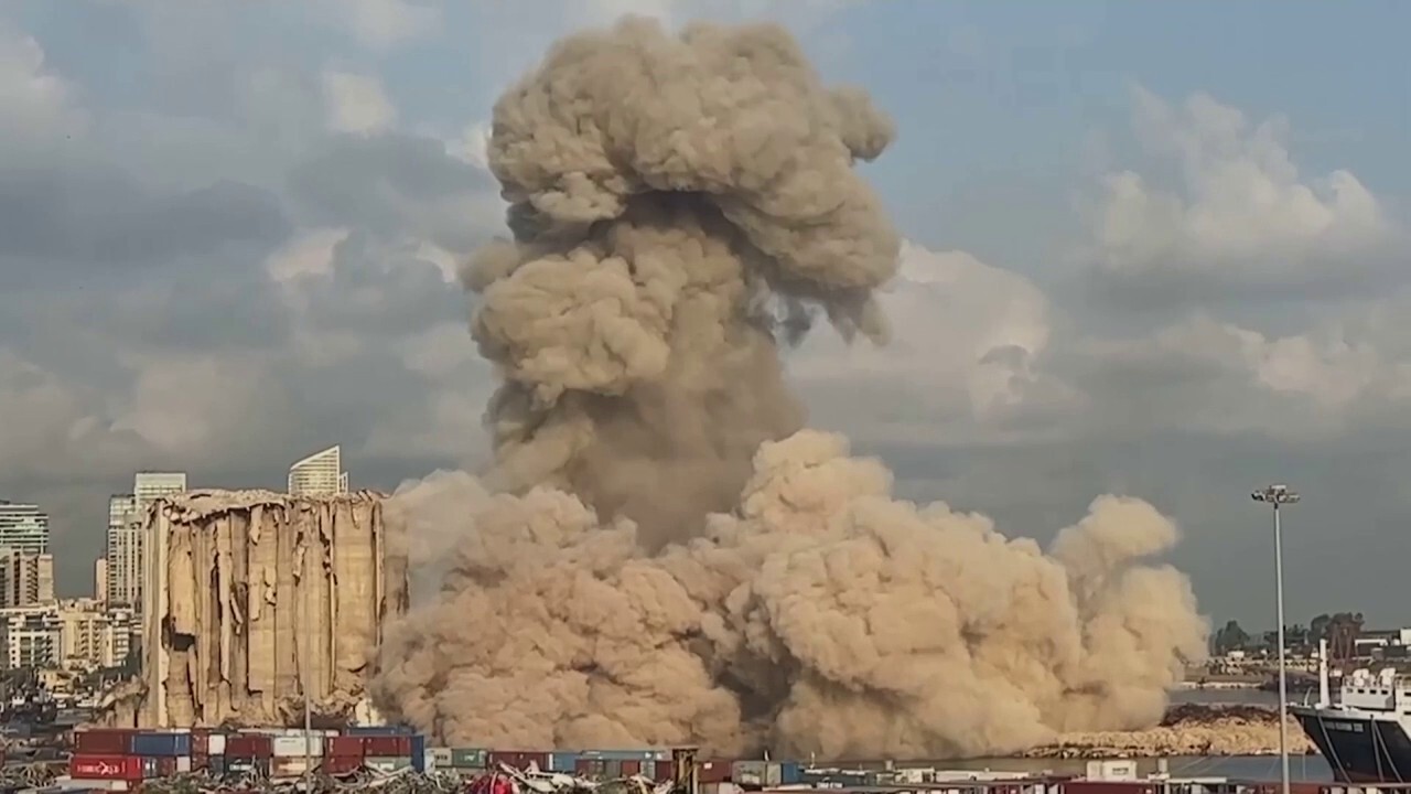 Two years after Beirut blast, another smoldering section of port silos collapses