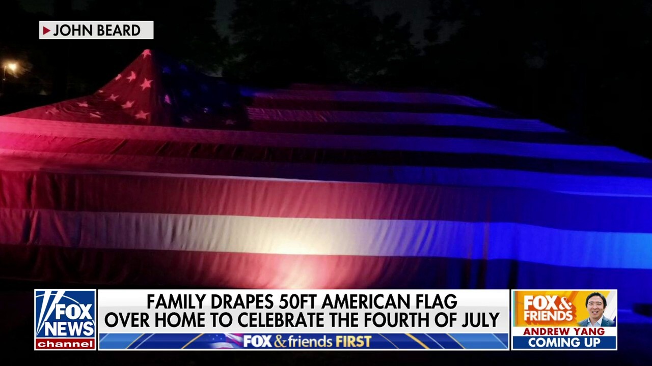 Family celebrates Independence Day by draping house in 50-foot American flag