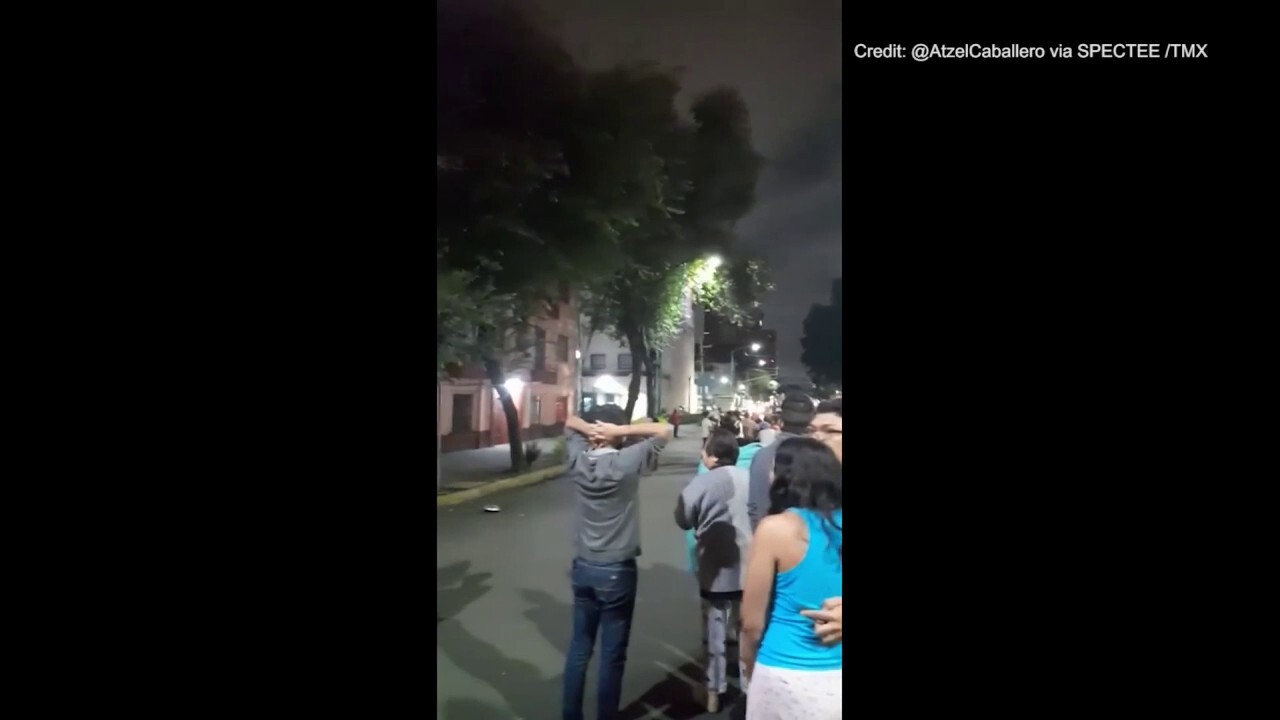 People in Mexico rush outdoors after 6.8 magnitude earthquake