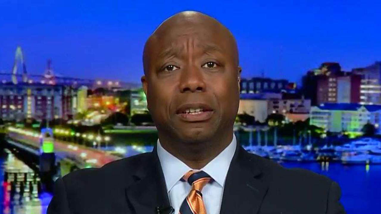 Sen. Tim Scott reacts to violent protests outside of a Trump rally in Minnesota