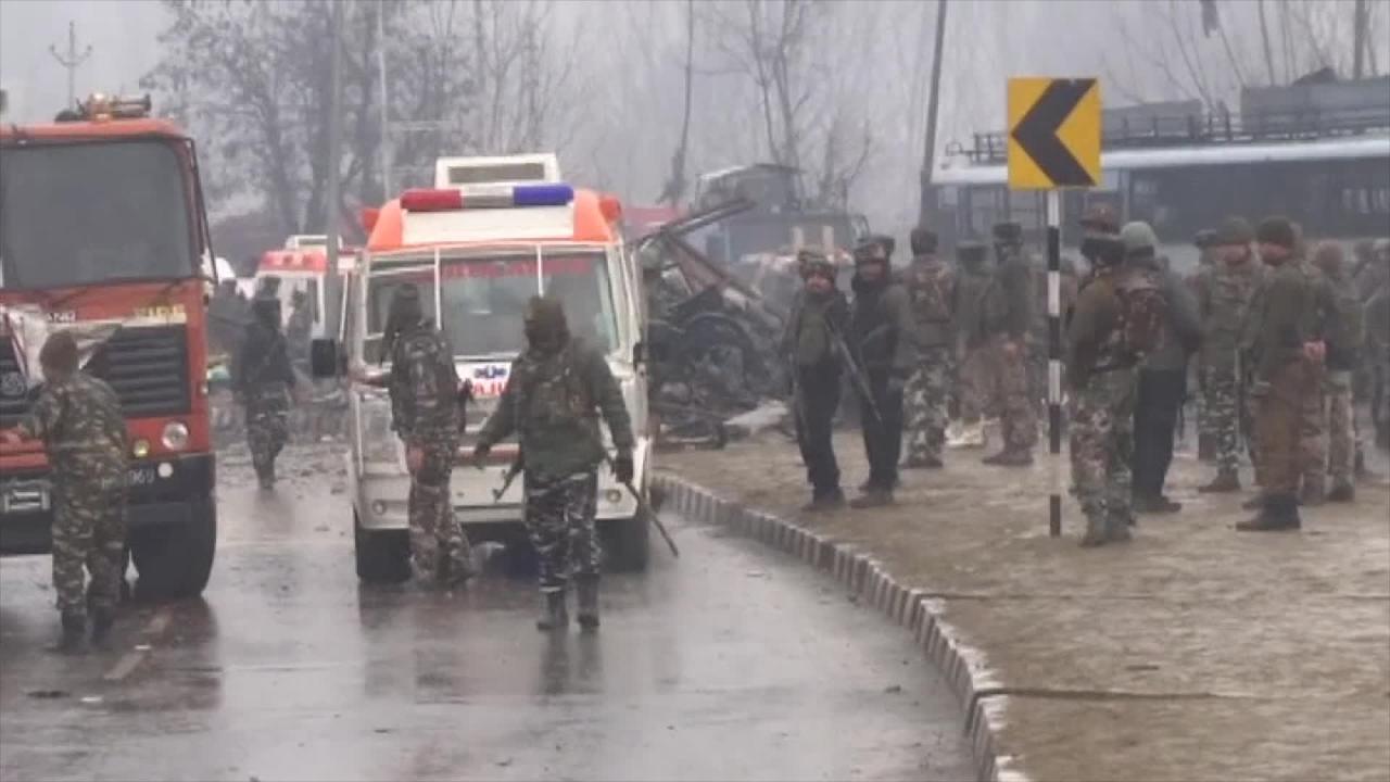 Deadly car bomb attack on an Indian military convey kills dozens in India-controlled Kashmir 