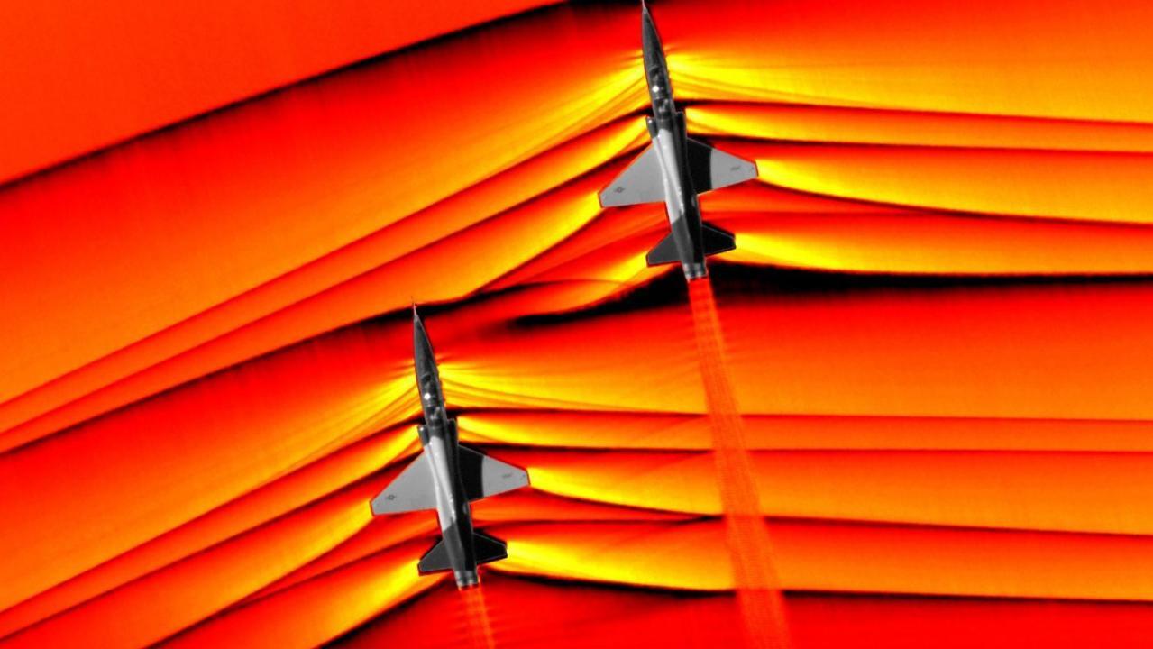 NASA captures stunning images showing colliding shock waves from two pairs of T-38 jets flying at supersonic speeds