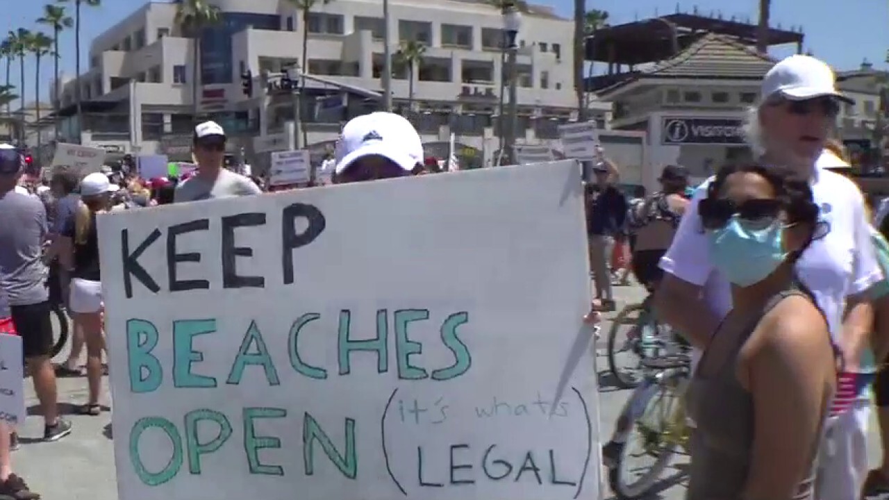 California residents call on governor to reopen beaches 