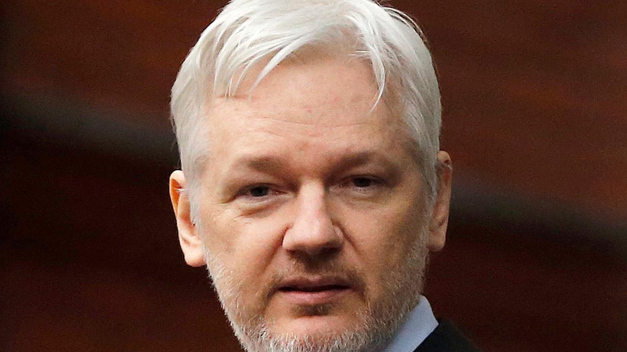 Assange claims journalistic cover
