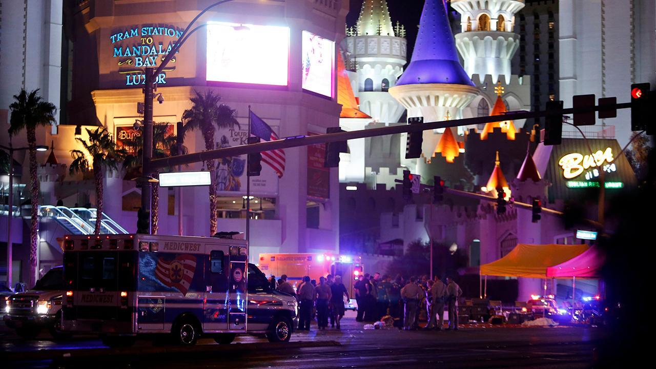 Crowds push down gates, fences to escape Las Vegas attack