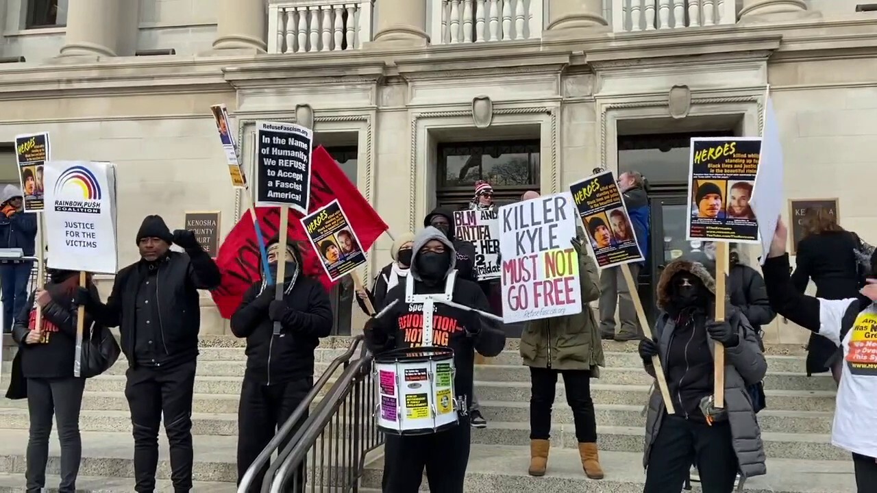 Protesters gather outside of the Kenosha County Courthouse to protest Kyle Rittenhouse