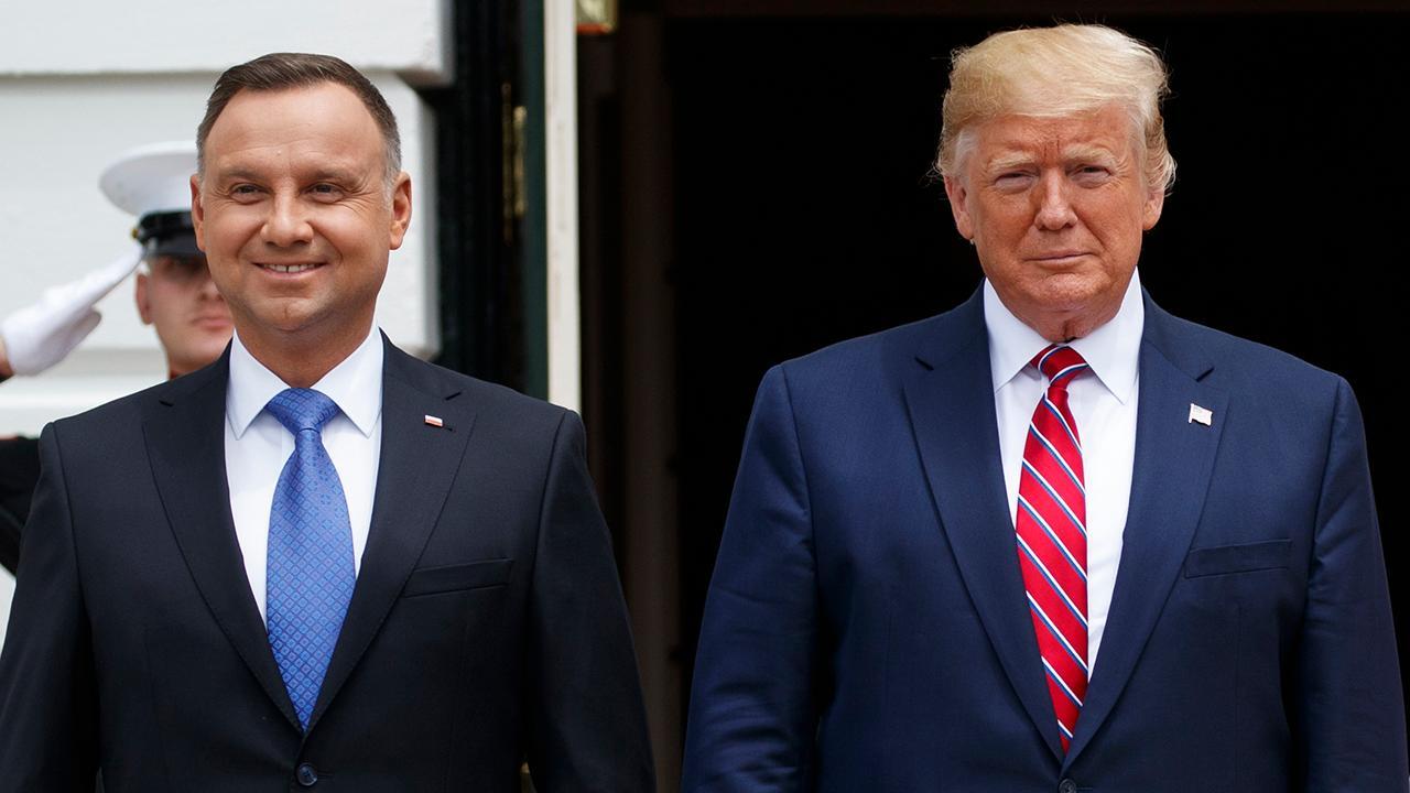 Trump participates in joint press conference with Polish President Duda