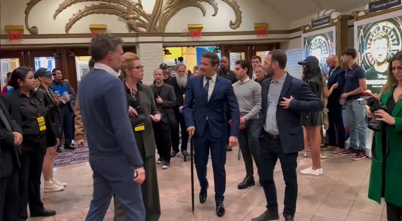 Jeremy Renner uses cane to walk into premiere of "Rennervations"